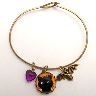 Green Eyed Cat with BAt Charm and Purple Heart Bead Bracelet